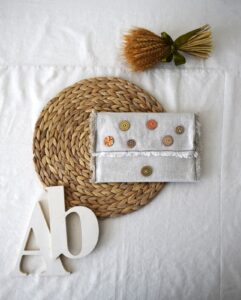 Clutch con Botones